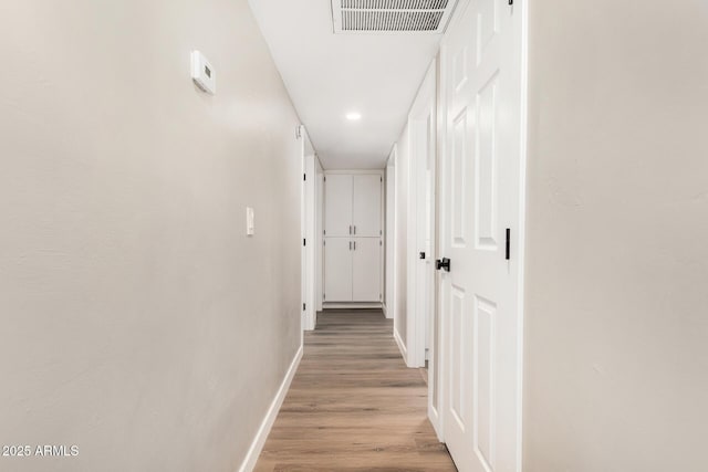 13805 N 31st Ave, Phoenix, AZ 85053 - corridor featuring light wood finished floors and recessed lighting