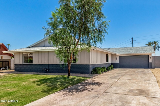 13805 N 31st Ave, Phoenix, AZ 85053 - single story home with an attached garage, board and batten siding, concrete driveway, and brick siding