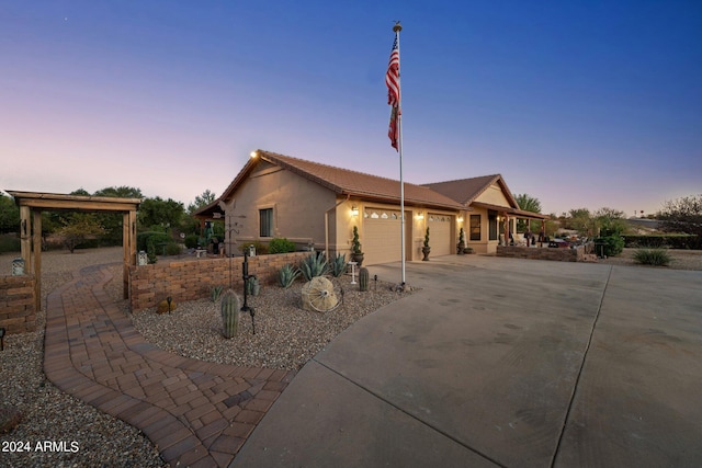 single story home with a garage