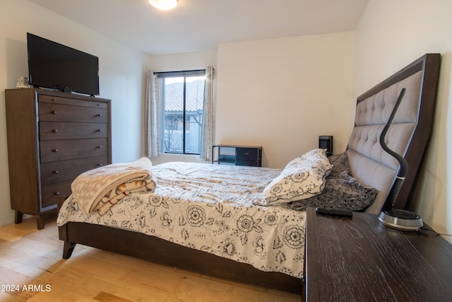 bedroom featuring light hardwood / wood-style flooring