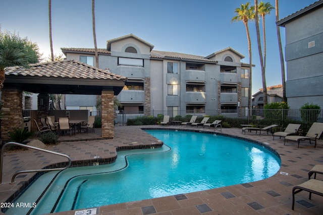 view of pool featuring a gazebo and a patio area