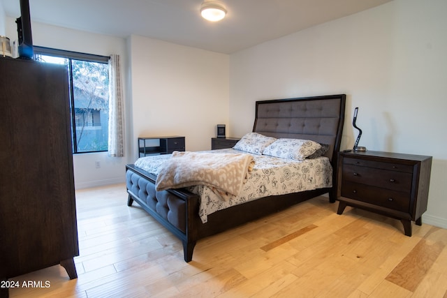 bedroom featuring light wood-type flooring