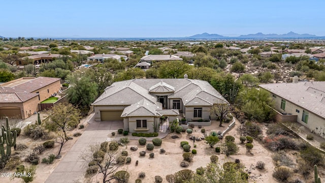 drone / aerial view featuring a mountain view