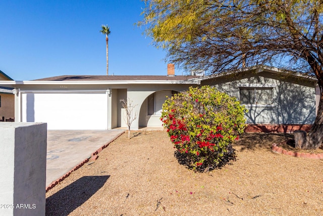 ranch-style house with a garage