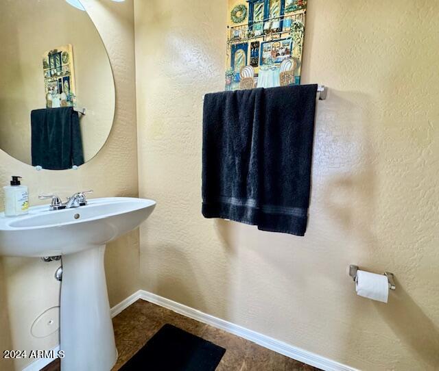 bathroom with tile patterned floors