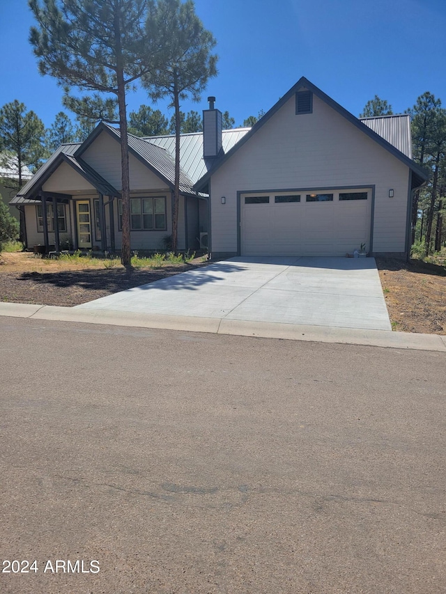 ranch-style home featuring a garage