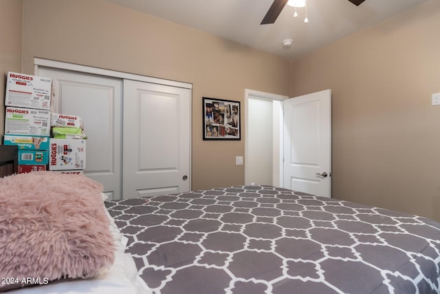 bedroom featuring a closet and a ceiling fan