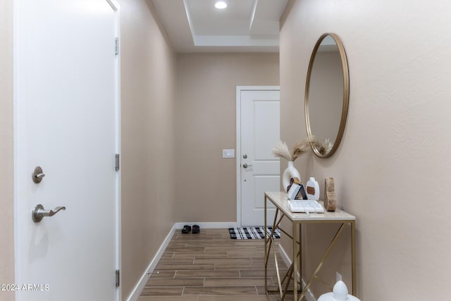 doorway to outside featuring recessed lighting, baseboards, and wood finish floors