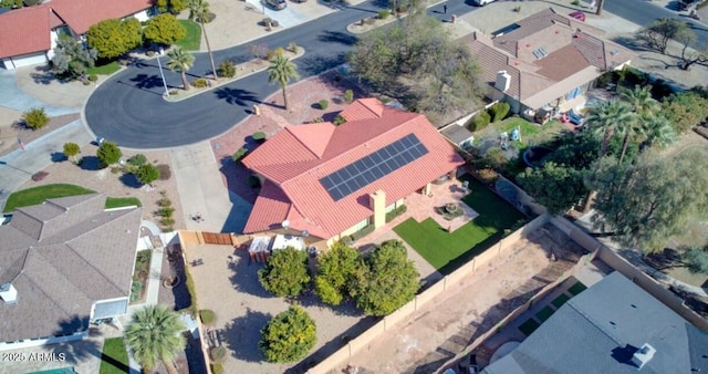 birds eye view of property with a residential view