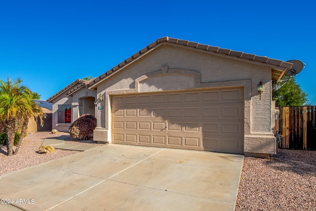 view of front of home featuring a garage