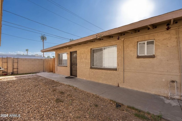 7101 N 36th Ave Unit 102, Phoenix, AZ 85051 - view of home's exterior featuring stucco siding