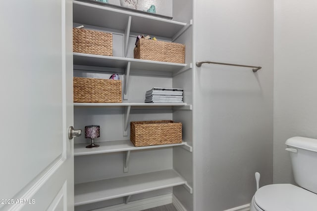 2597 E Hickory St, Gilbert, AZ 85298 - bathroom with baseboards and toilet
