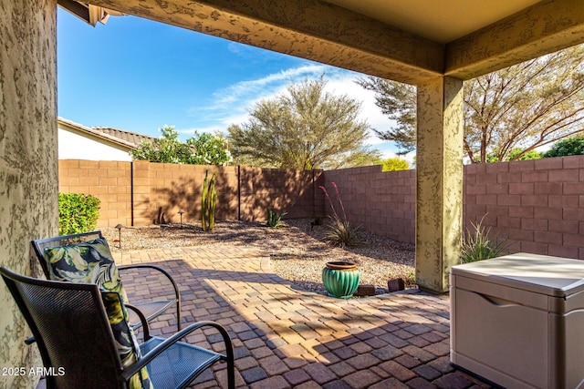 2597 E Hickory St, Gilbert, AZ 85298 - fenced backyard with a patio