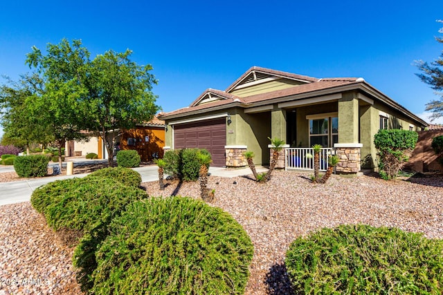 2597 E Hickory St, Gilbert, AZ 85298 - ranch-style house featuring stucco siding, covered porch, stone siding, a garage, and a tile roof