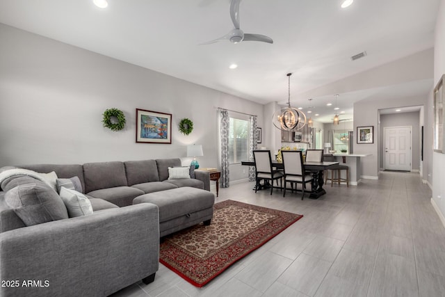 2597 E Hickory St, Gilbert, AZ 85298 - living area featuring a ceiling fan, recessed lighting, a chandelier, vaulted ceiling, and baseboards