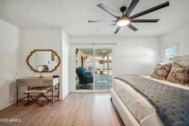 bedroom featuring ceiling fan, access to outside, and light wood-type flooring