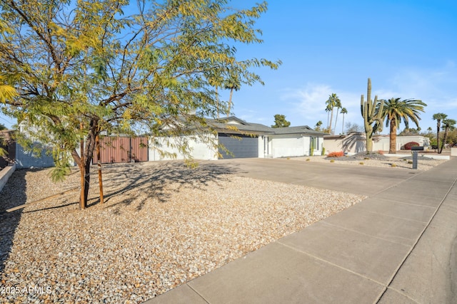 single story home with a garage