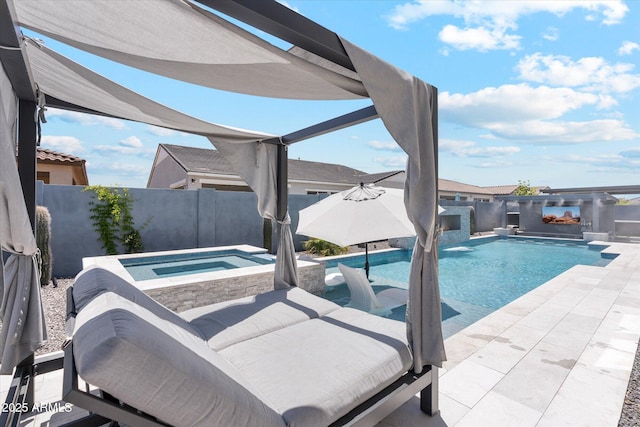 view of pool featuring a fenced backyard, an in ground hot tub, a patio area, and a fenced in pool