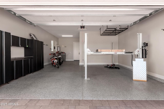 garage with baseboards