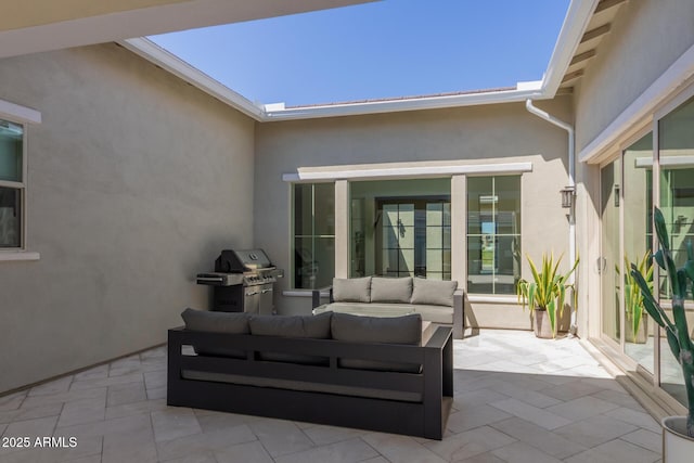 view of patio / terrace featuring outdoor lounge area and area for grilling