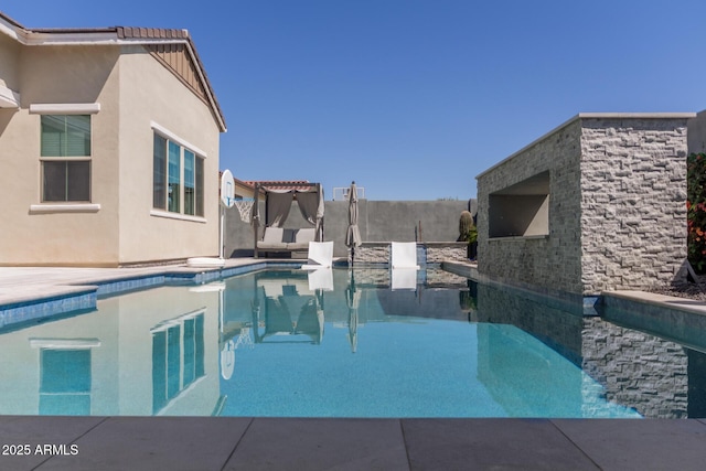 pool with a patio area