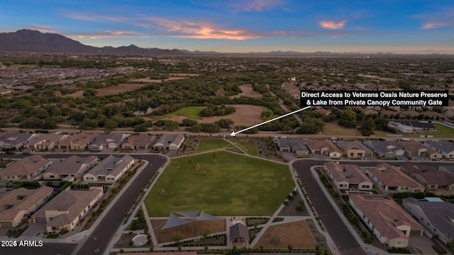 drone / aerial view with a mountain view and a residential view