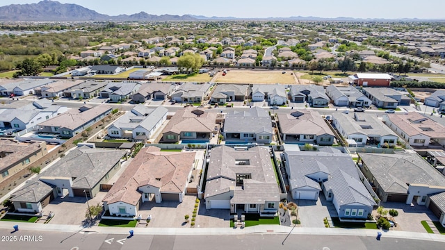 aerial view featuring a mountain view and a residential view