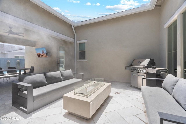 view of patio / terrace featuring outdoor dining area and an outdoor living space with a fire pit