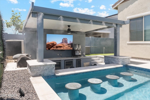 view of patio / terrace with fence and ceiling fan