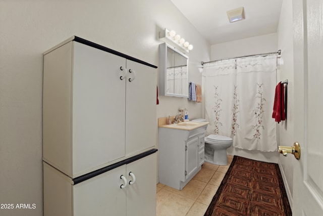 full bathroom with tile patterned flooring, toilet, visible vents, vanity, and shower / tub combo with curtain