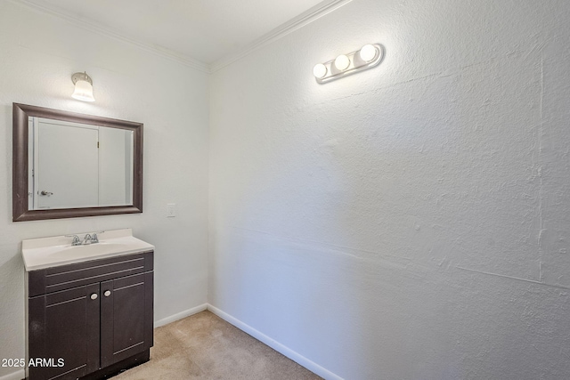 bathroom with crown molding and vanity