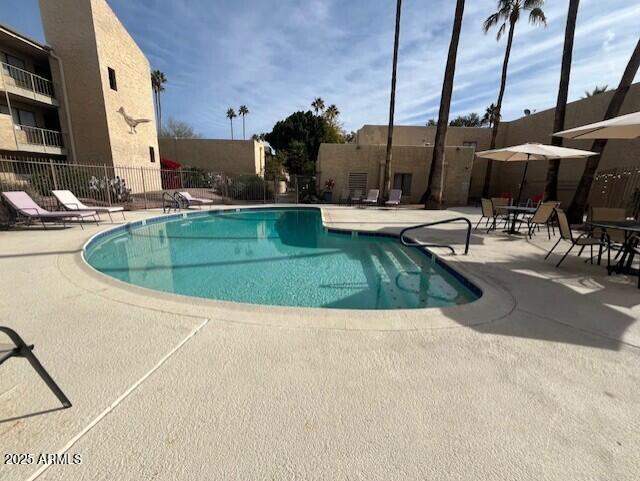 view of pool featuring a patio area