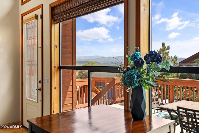 doorway to outside with a mountain view