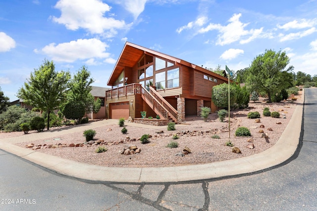 view of front of property featuring a garage