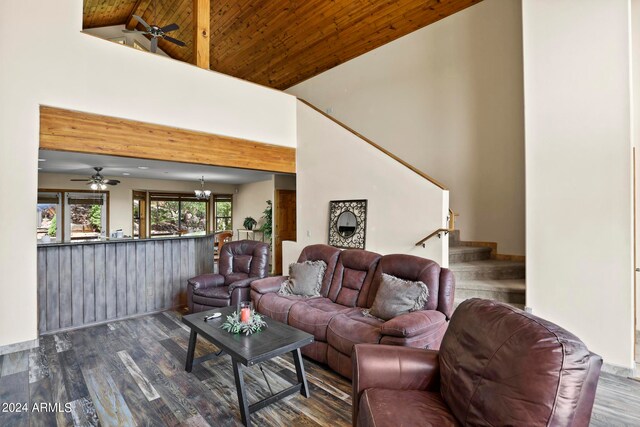 living room featuring ceiling fan with notable chandelier, high vaulted ceiling, wood ceiling, and wood-type flooring