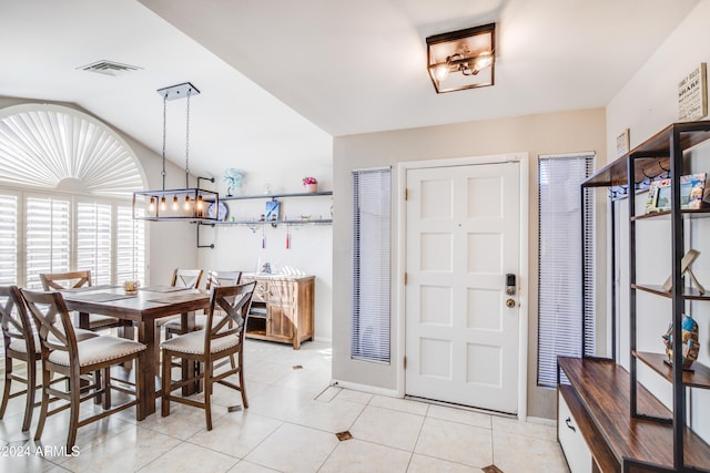 dining area with light tile patterned floors