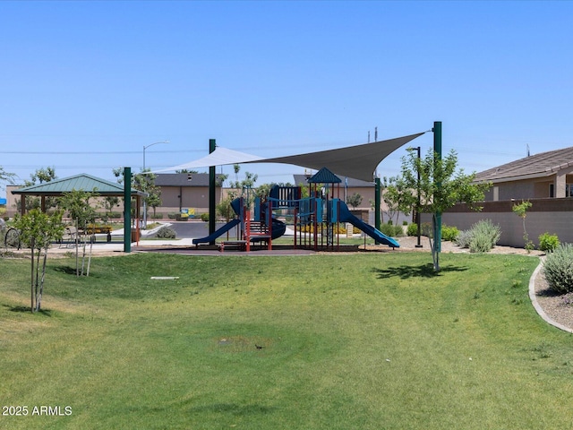 view of playground featuring a gazebo and a lawn