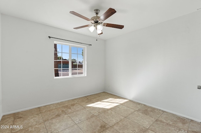 unfurnished room featuring ceiling fan