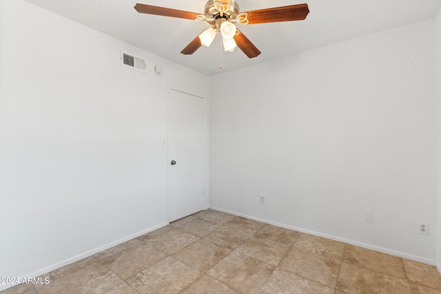 empty room featuring ceiling fan