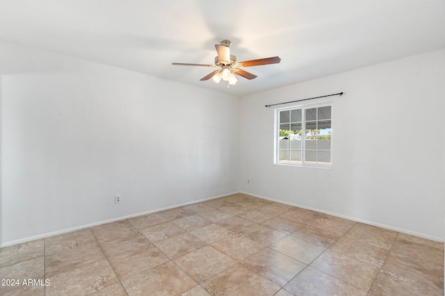 spare room featuring ceiling fan