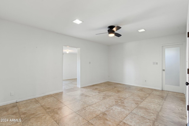 spare room featuring ceiling fan