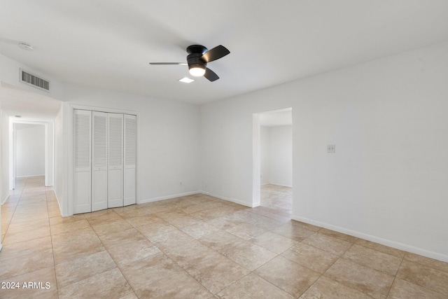 spare room featuring ceiling fan