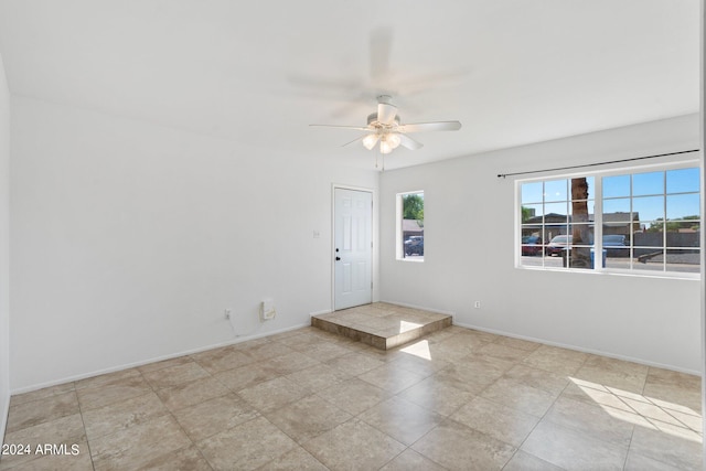 empty room with ceiling fan