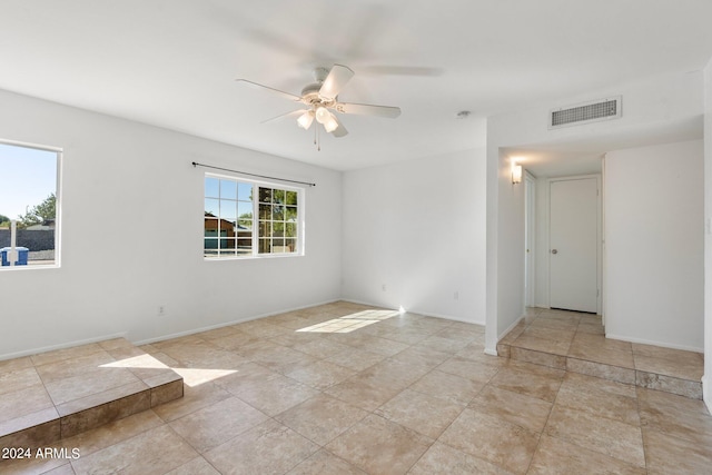 spare room featuring ceiling fan