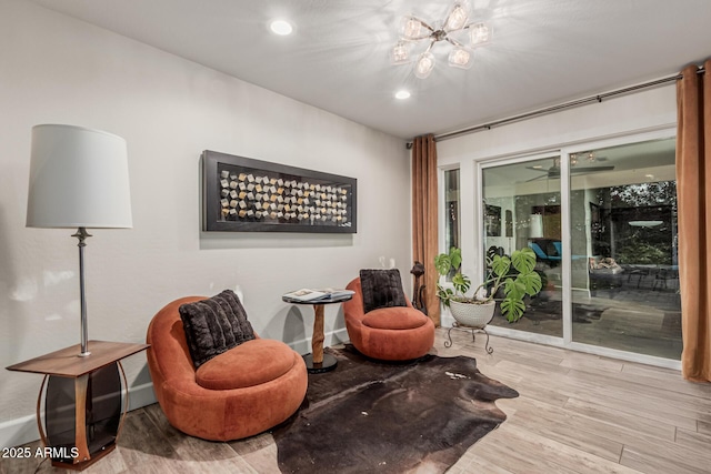 11822 S Coconino St, Phoenix, AZ 85044 - sitting room featuring wood finished floors, baseboards, and recessed lighting