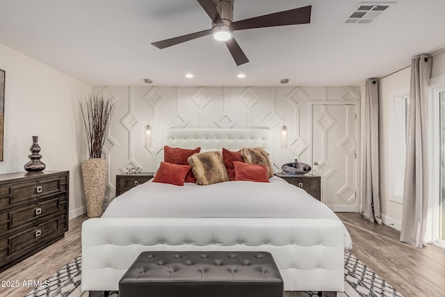 11822 S Coconino St, Phoenix, AZ 85044 - bedroom with baseboards, light wood-style floors, recessed lighting, and a ceiling fan