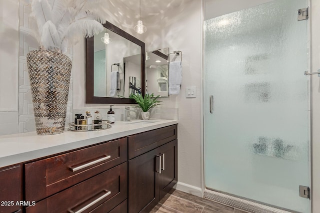 11822 S Coconino St, Phoenix, AZ 85044 - full bath with a stall shower, vanity, and wood finished floors