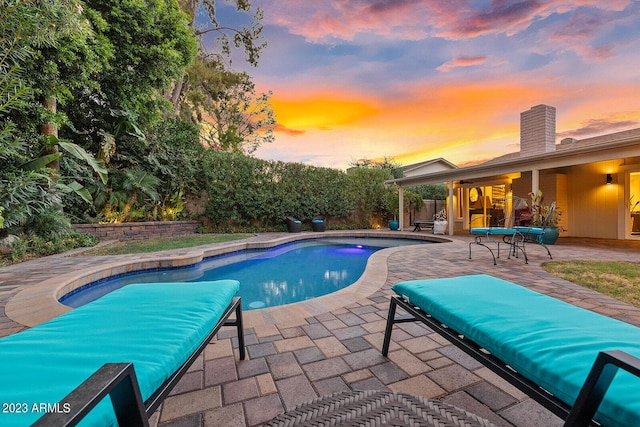 11822 S Coconino St, Phoenix, AZ 85044 - pool at dusk featuring a patio