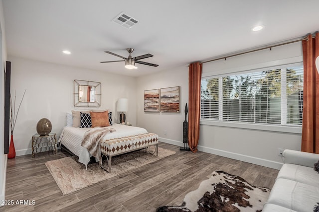 11822 S Coconino St, Phoenix, AZ 85044 - bedroom with baseboards, wood finished floors, recessed lighting, and ceiling fan
