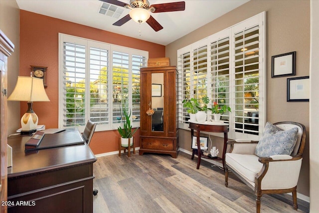 office space with ceiling fan and wood-type flooring